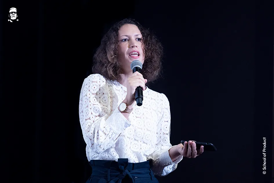 Marion Débonnaire speaking on stage at School of Product